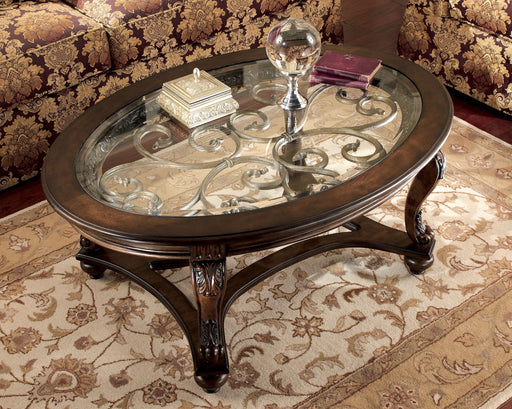 Norcastle - Dark Brown - Oval Cocktail Table - Simple Home Plus