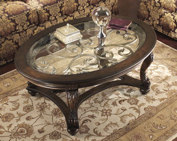 Norcastle - Dark Brown - Oval Cocktail Table - Simple Home Plus