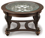 Norcastle - Dark Brown - Oval Cocktail Table - Simple Home Plus